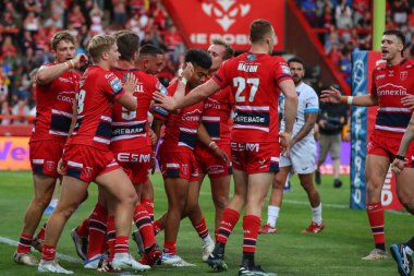 Elliot Minchella #17 of Hull KR celebrates his try in the first half