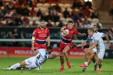 Shaun Kenny-Dowall #4 of Hull KR makes a break which leads to Frankie Haltons try 