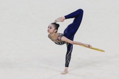 Izzah Binti Amzan of Malaysia performs her hoop routine