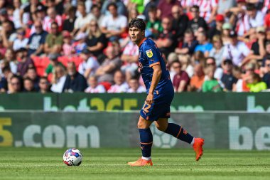 Kenny Dougall #12 of Blackpool in action during the game