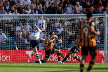 Ben Whiteman #4 of Preston North End drives a shot over the Hull City bar
