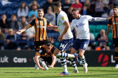 Alan Browne #8 of Preston North End brings down Jacob Greaves #4 of Hull City