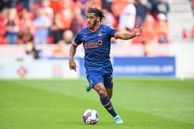Dominic Thompson #23 of Blackpool makes a break with the ball