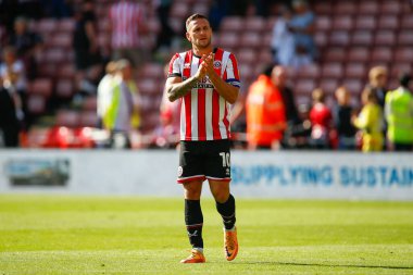 Billy Sharp #10 of Sheffield United applauds fans after the game