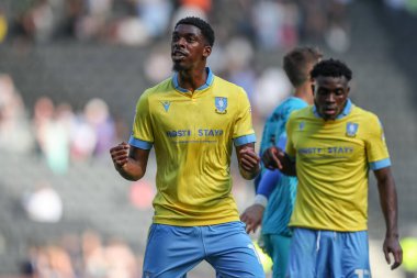 Tyreeq Bakinson #19 of Sheffield Wednesday celebrates his teams win