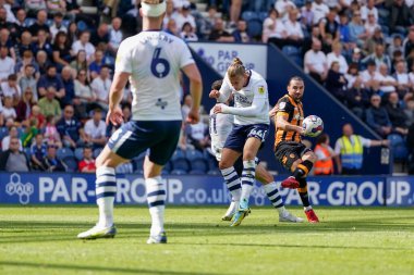 Lewis Coyle #2 of Hull City curls a shot round Brad Potts #40 of Preston North End