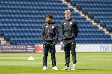 Vaughn Covil #49 and David Robson #37 of Hull City inspect the pitch before the match