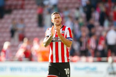 Billy Sharp #10 of Sheffield United applauds fans after the game