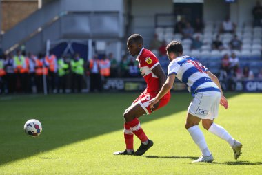 Anfernee Dijksteel #15 of Middlesbrough passes the ball under pressure 