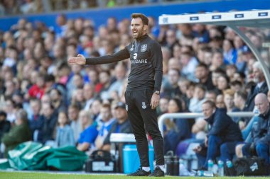Danny Schofield manager of Huddersfield Town gestures and reacts during the game 