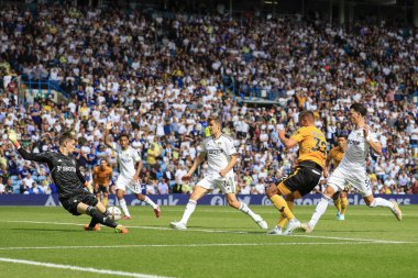 Illan Meslier #1 of Leeds United makes a save from Leander Dendoncker #32 of Wolverhampton Wanderers