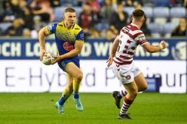 George Williams #7 of Warrington Wolves makes a break