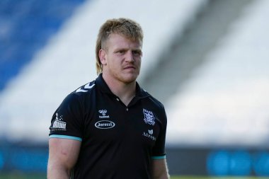 Brad Fash #17 of Hull FC inspects the pitch before the game 