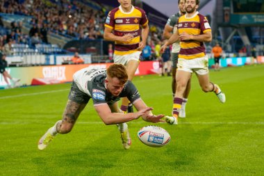 Ellis Longstaff #38 of Hull FC  dives over to score his sides third try of the match