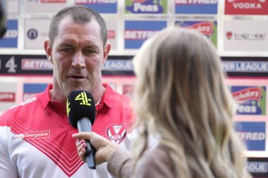 Kristian Woolf Head Coach of St Helens is interviewed by Helen Skelton for Channel 4 TV 