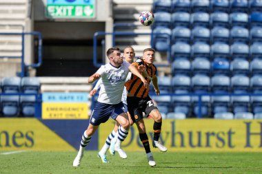 Ben Whiteman #4 of Preston North End competes for the ball with Regan Slater #27 of Hull City
