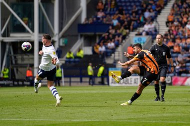 Ozan Tufan #7 of Hull City curls a shot past Alan Browne #8 of Preston North End