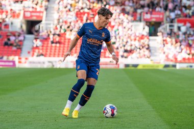 Theo Corbeanu #25 of Blackpool in action during the game