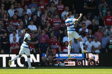 Lyndon Dykes #9 of QPR celebrates his goal to make it 3-0