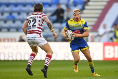 Oliver Holmes #12 of Warrington Wolves in action
