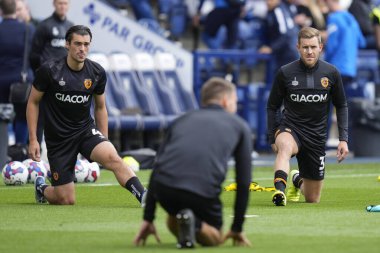 Jacob Greaves #4 and Callum Elder #3 of Hull City warms up before the game