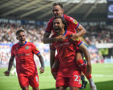 Lewis Travis (27) of Blackburn Rovers  celebrates his goal to make it 0-2