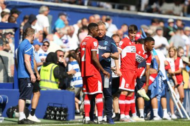 Chris Wilder manager of Middlesbrough gives instructions to Isaiah Jones at half time