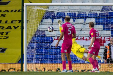 Przemysaw Pachetas shot finds the back of the net as Lee Nicholls #21 of Huddersfield Town fails to get a hand to it during the first half  