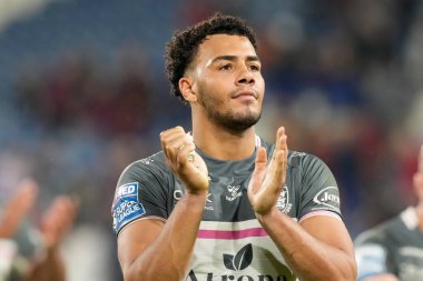 Darnell McIntosh #5 of Hull FC  salutes the fans after the game