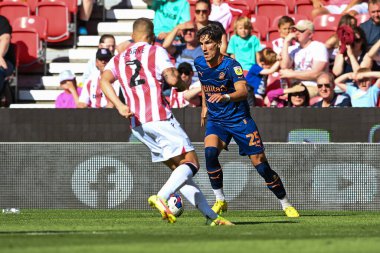 Theo Corbeanu #25 of Blackpool in action during the game