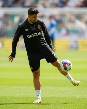 Ozan Tufan #7 of Hull City juggles the ball before the game