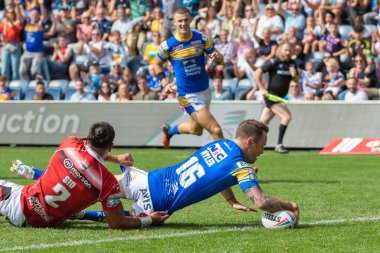 Richie Myler #16 of Leeds Rhinos goes over for a try and makes the score 10-0 in the first half 