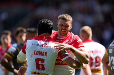 Joe Batchelor #12 of St Helens celebrates with Jonny Lomax