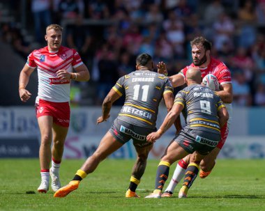 Alex Walmsley #8 of St Helens  hands off Kenny Edwards #11 of Castleford Tigers