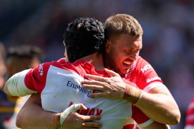 Joe Batchelor #12 of St Helens celebrates with Jonny Lomax