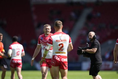 Joe Batchelor #12 of St Helens celebrates with Tommy Makinson