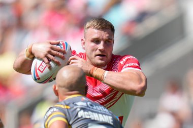 Matty Lees #10 of St Helens runs at Paul McShane #9 of Castleford Tigers