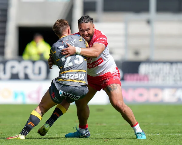Konrad Hurrell #23 of St Helens tackles Greg Eden #23 of Castleford Tigers 
