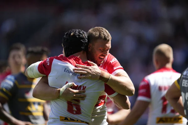 Joe Batchelor #12 of St Helens celebrates with Jonny Lomax