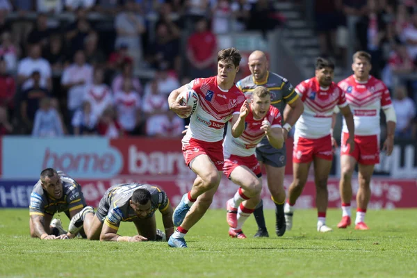 Joe Bennison #27 of St Helens breaks through the Castleford Tigers defence