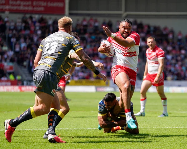 Konrad Hurrell #23 of St Helens drives for the line 