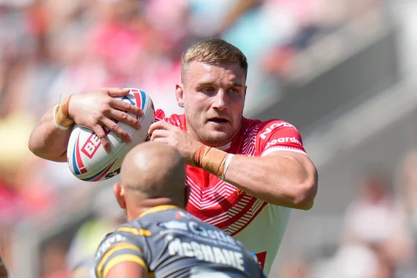 Matty Lees #10 of St Helens runs at Paul McShane #9 of Castleford Tigers
