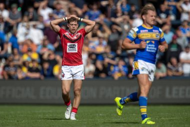A dejected Chris Atkin #18 of Salford Red Devils puts his hands on his head as Leeds extend their lead 