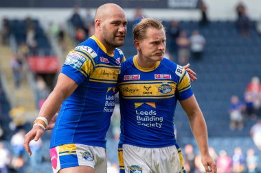 Bodene Thompson #19 and Brad Dwyer #14 of Leeds Rhinos celebrate after the game 