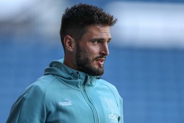 Okay Yokuslu #35 of West Bromwich Albion arrives at the game prior to kick off