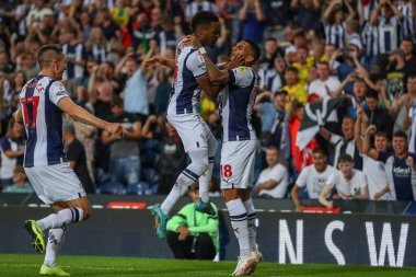 Karlan Grant #18 (right) of West Bromwich Albion celebrates his goal to make it 1-1 with Grady Diangana #11 of West Bromwich Albion (middle) and Jed Wallace #17 of West Bromwich Albion (left)