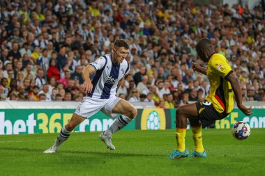 Dara O'Shea #4 of West Bromwich Albion gets the better of Edo Kayembe #39 of Watford