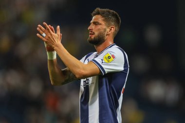 Okay Yokuslu #35 of West Bromwich Albion applauds the home fans after the final whistle