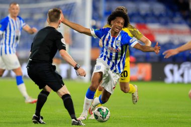 Etienne Camara #24 of Huddersfield Town shows his frustration at a refereeing decision