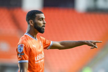 CJ Hamilton #22 of Blackpool gives his team instructions